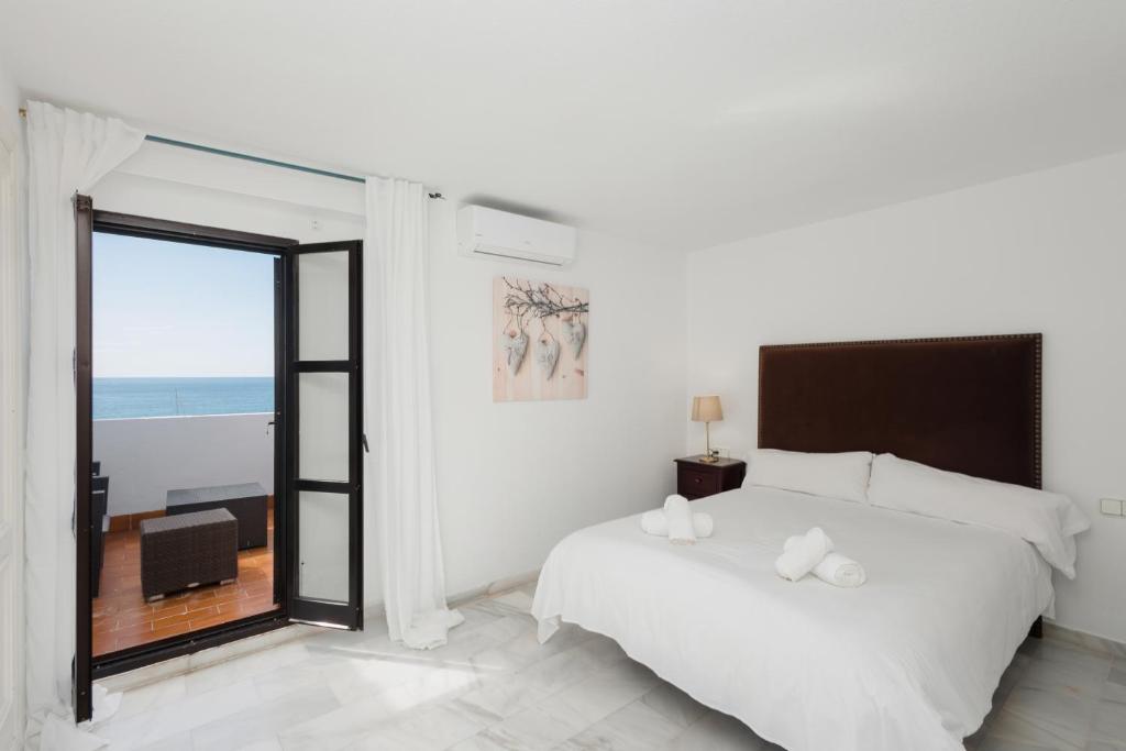Posteľ alebo postele v izbe v ubytovaní Penthouse in Puerto Banus with sea and marina views