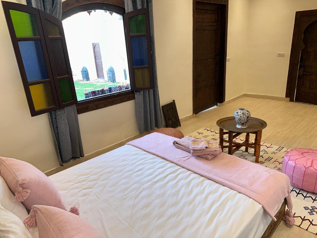 Postel nebo postele na pokoji v ubytování Oasis Merasi Marrakech