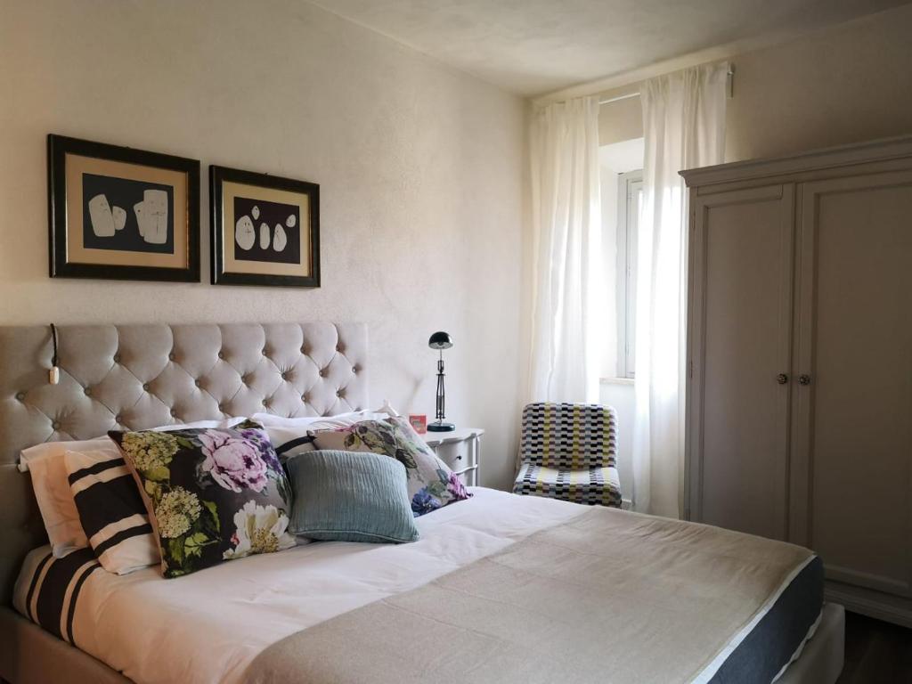 Ένα ή περισσότερα κρεβάτια σε δωμάτιο στο il Borgo