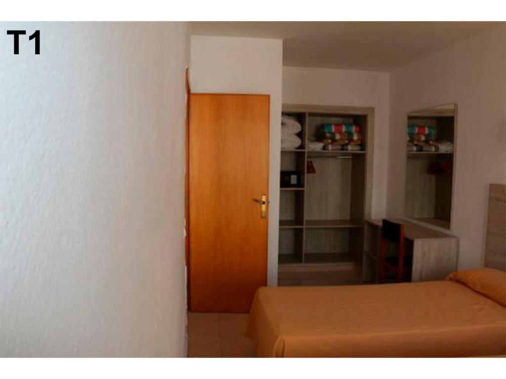 Posteľ alebo postele v izbe v ubytovaní Apartaments Sala Mar