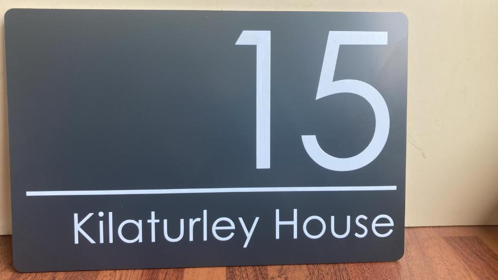 a sign for a kittyricky house at Kilaturley house apartment in Swinford