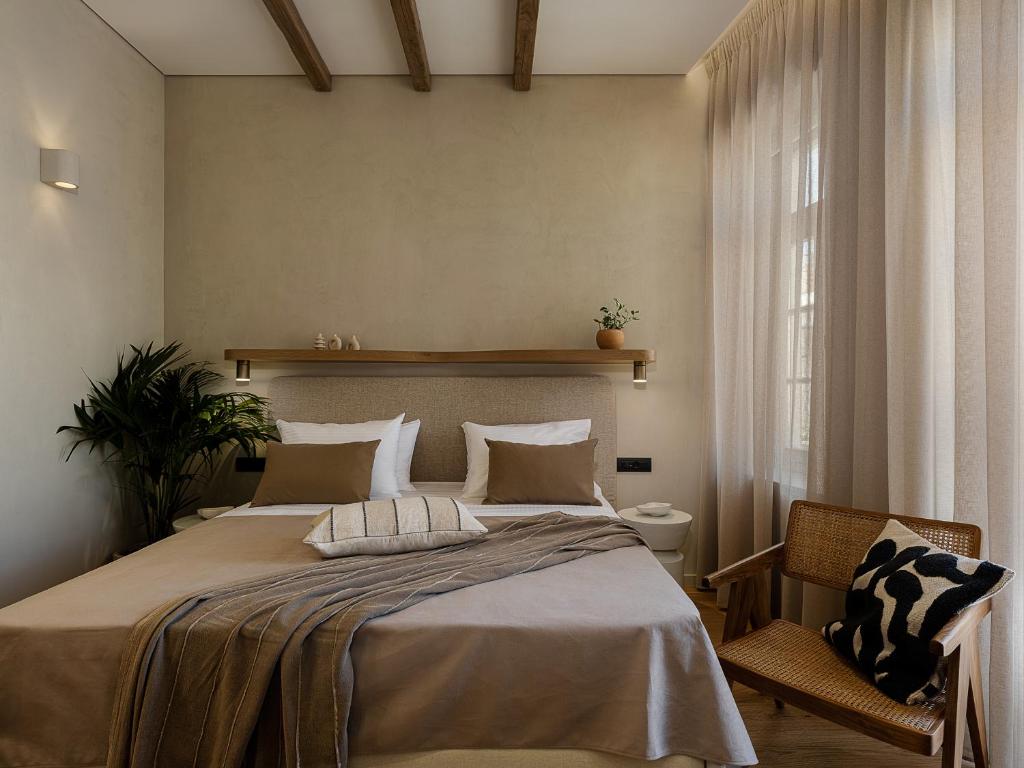 Postel nebo postele na pokoji v ubytování Casa Modiano Boutique