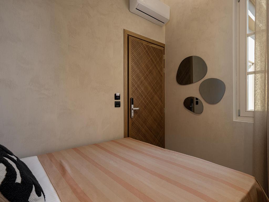 Postel nebo postele na pokoji v ubytování Casa Modiano Boutique