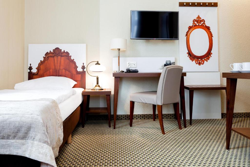 Posteľ alebo postele v izbe v ubytovaní Jantar Hotel & SPA by Zdrojowa