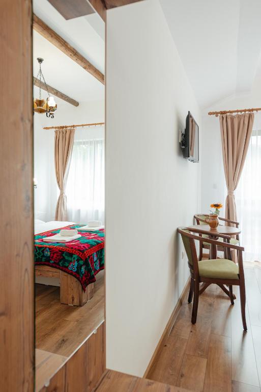 Postel nebo postele na pokoji v ubytování CONACUL TRANSILVAN