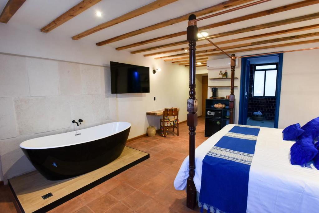 Postel nebo postele na pokoji v ubytování Casa Moseua