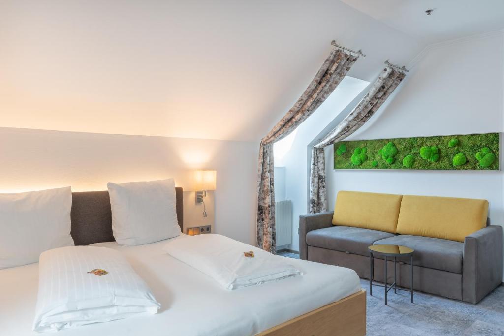 Postel nebo postele na pokoji v ubytování Hotel Kongress