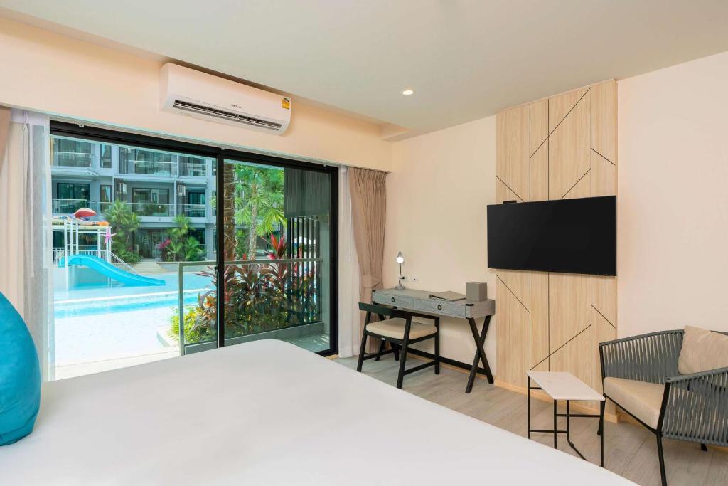 TV a/nebo společenská místnost v ubytování Best Western Plus Carapace Hotel Hua Hin