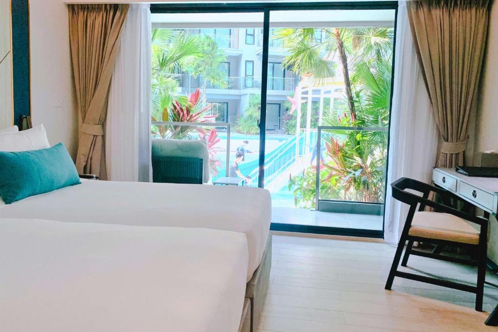 Postel nebo postele na pokoji v ubytování Best Western Plus Carapace Hotel Hua Hin