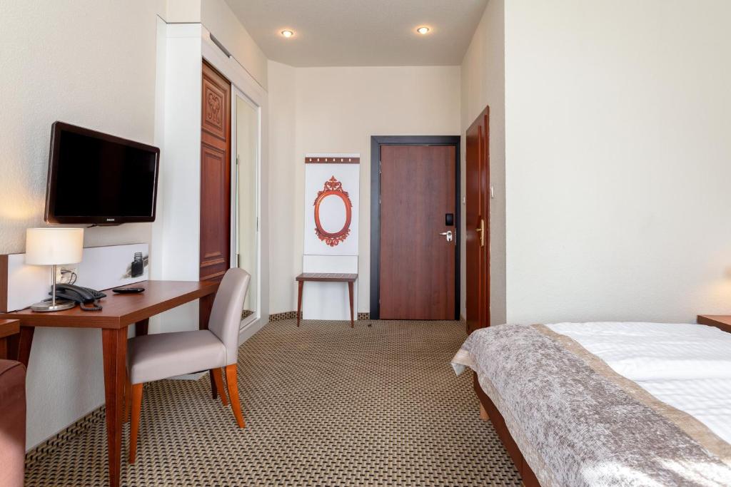 Posteľ alebo postele v izbe v ubytovaní Jantar Hotel & SPA by Zdrojowa