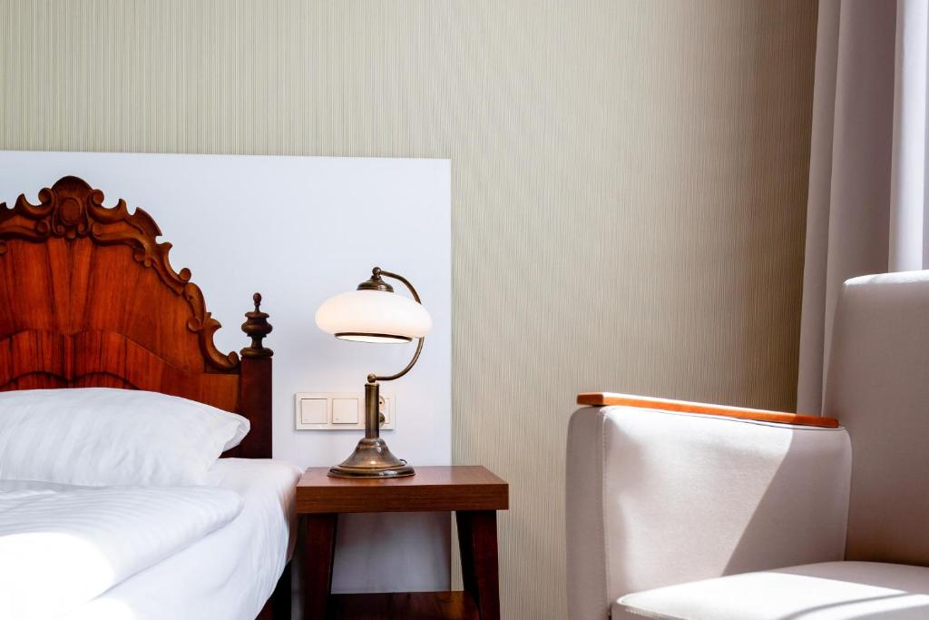 Posteľ alebo postele v izbe v ubytovaní Jantar Hotel & SPA by Zdrojowa
