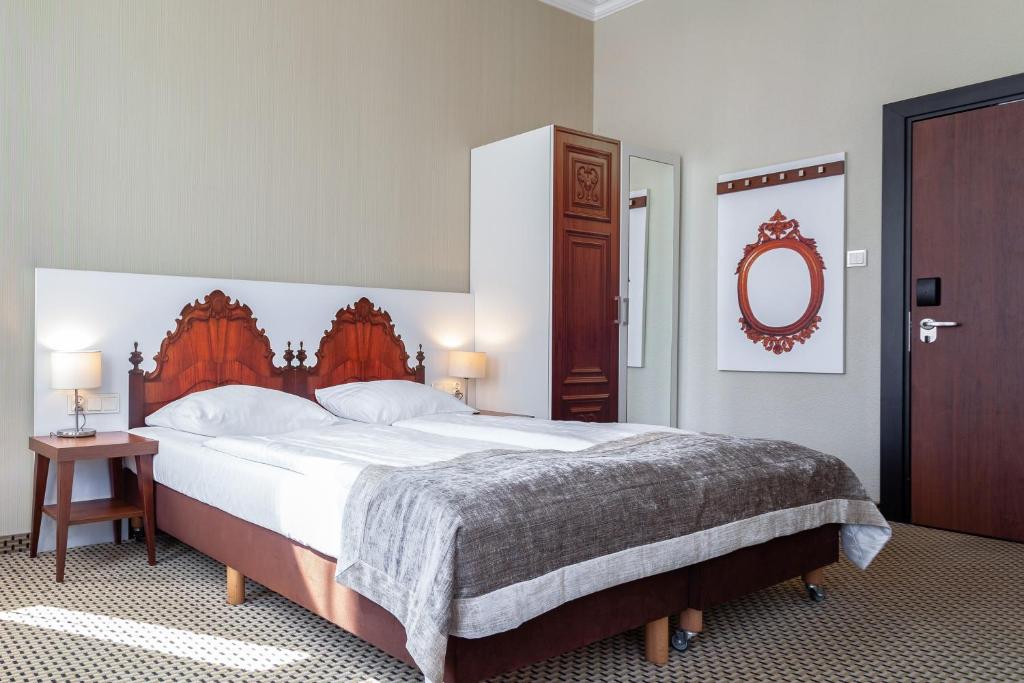 Posteľ alebo postele v izbe v ubytovaní Jantar Hotel & SPA by Zdrojowa
