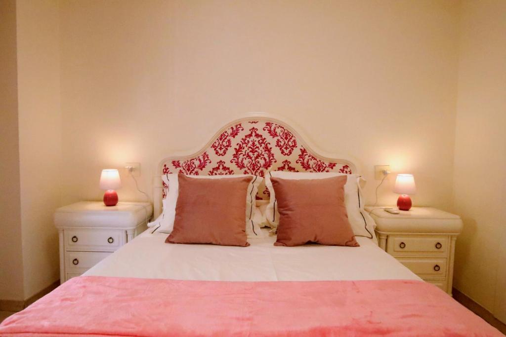 Postel nebo postele na pokoji v ubytování TESS Apartamento Las Camelias