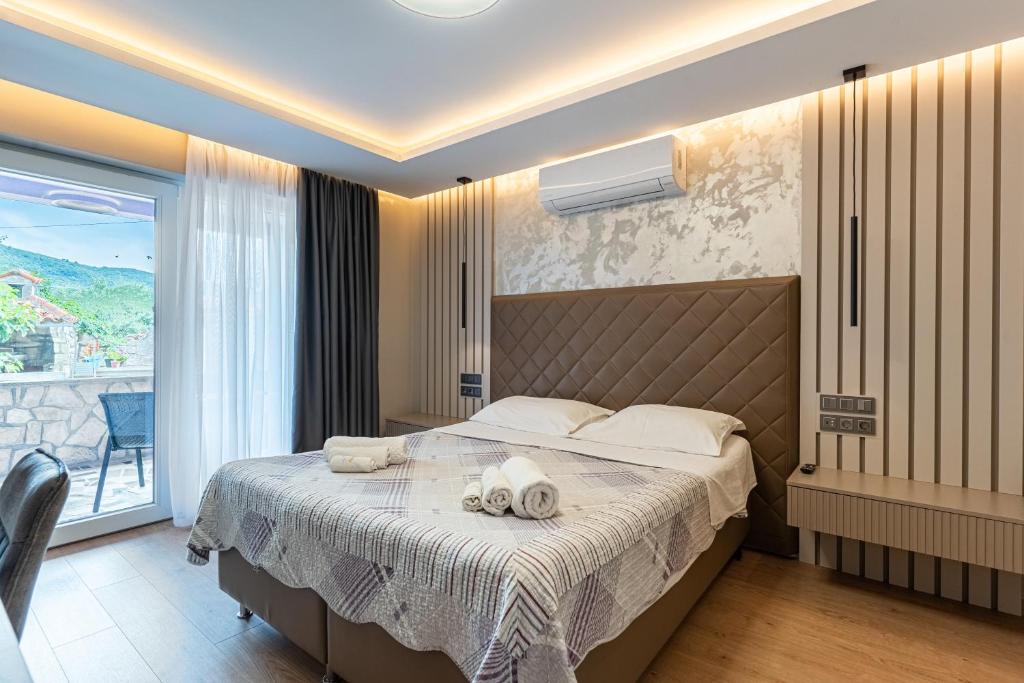 Postel nebo postele na pokoji v ubytování Villa Lavanda