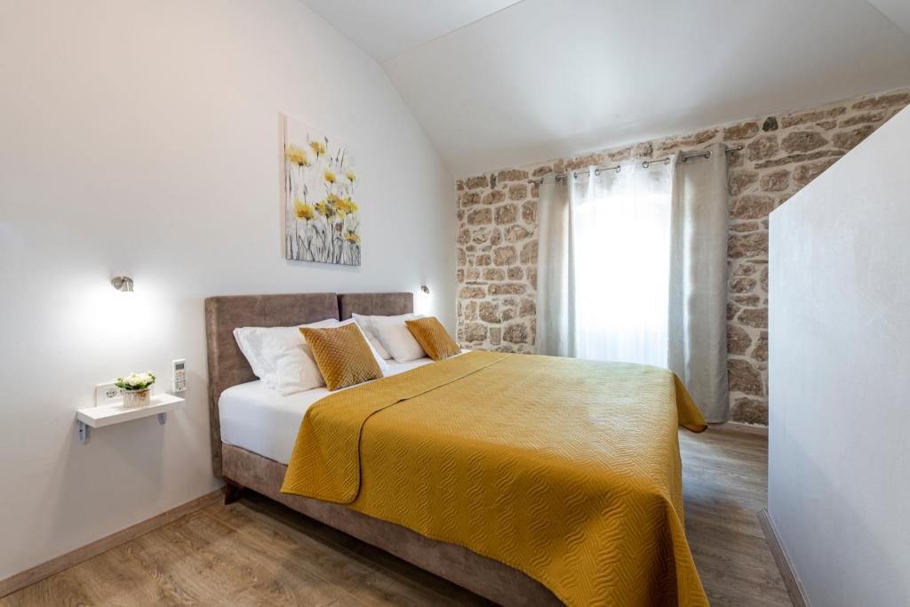 Postel nebo postele na pokoji v ubytování Villa Royal House