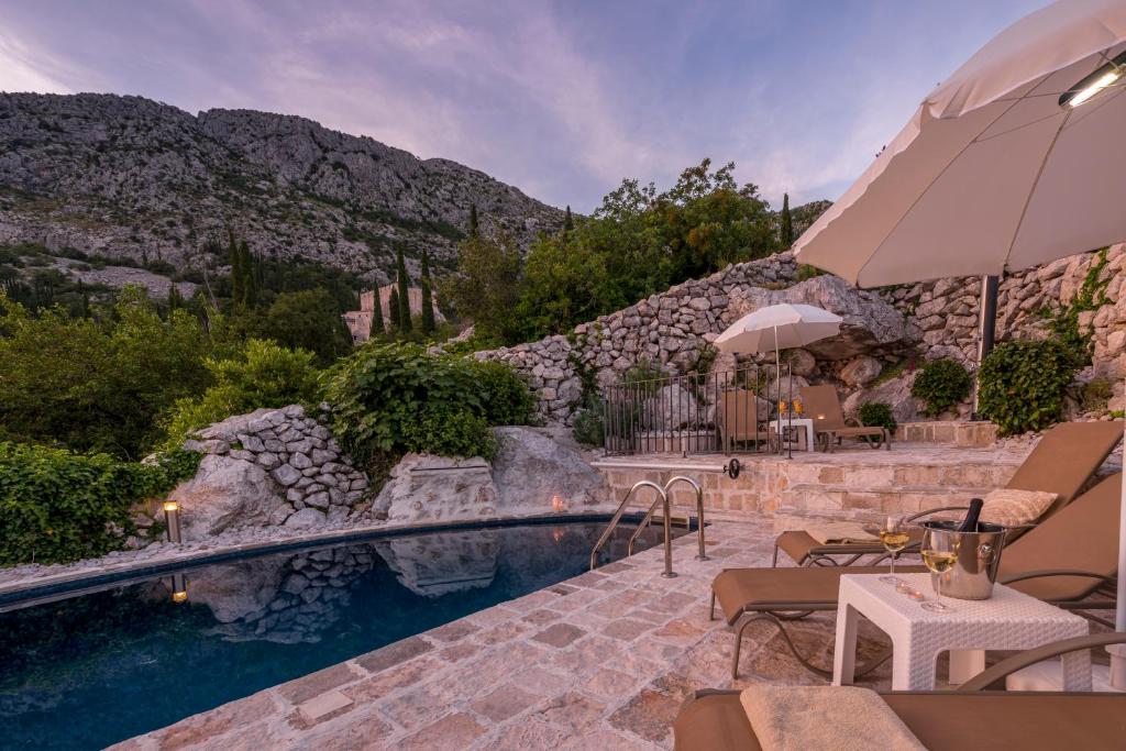 Bazén v ubytování Villa Royal House nebo v jeho okolí