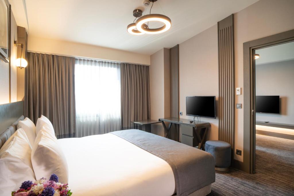 Arts Hotel Taksim客房内的一张或多张床位