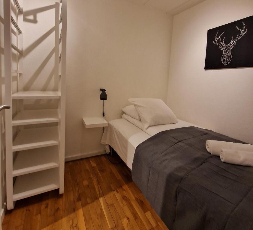 En eller flere senge i et værelse på Three Bedroom Apartment In Rdovre, Trnvej 33b, 2