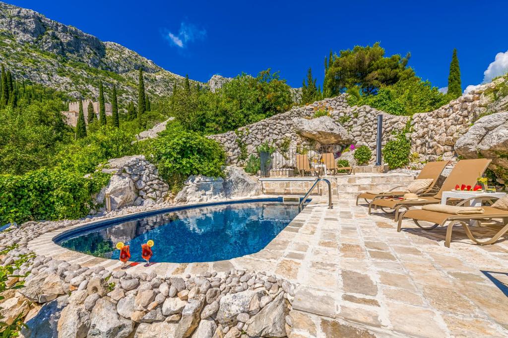 Bazén v ubytování Villa Royal House nebo v jeho okolí