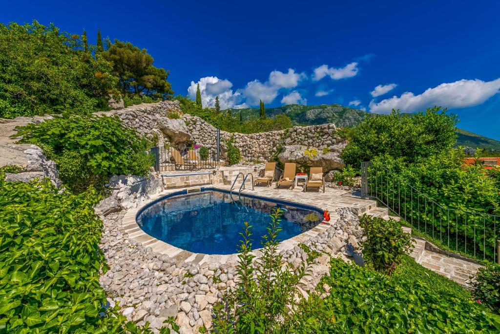 Bazén v ubytování Villa Royal House nebo v jeho okolí