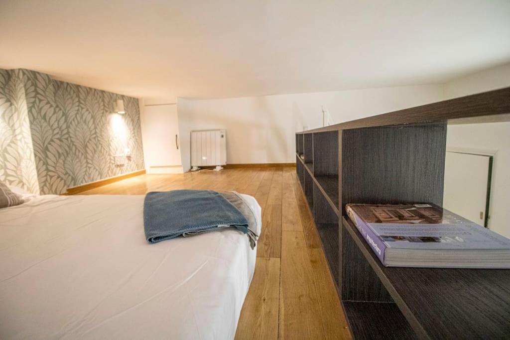 Postel nebo postele na pokoji v ubytování Pequeño estudio madrileño