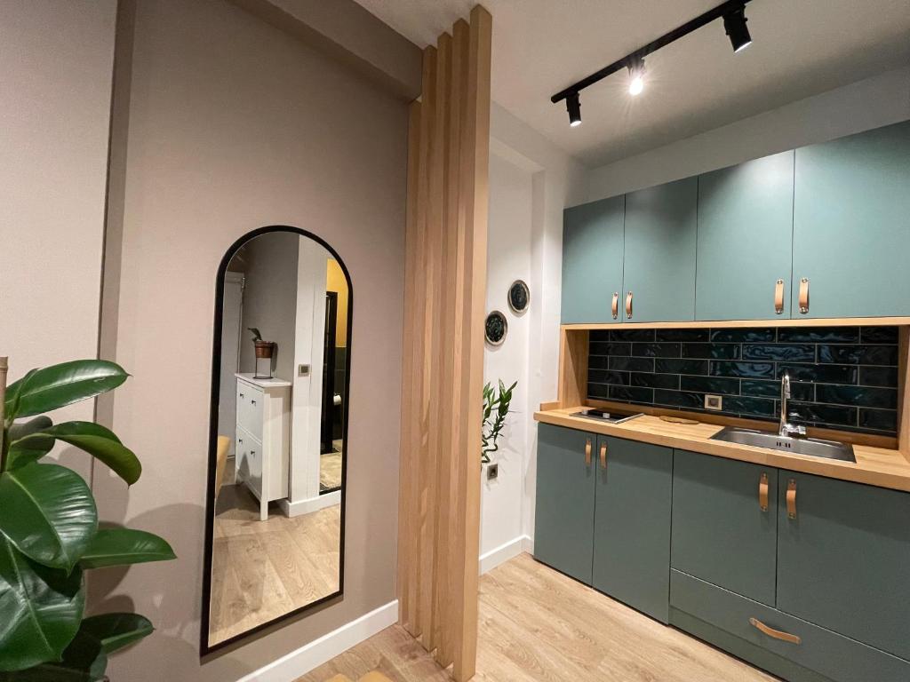 Kuchyň nebo kuchyňský kout v ubytování CLK Suites Hotel