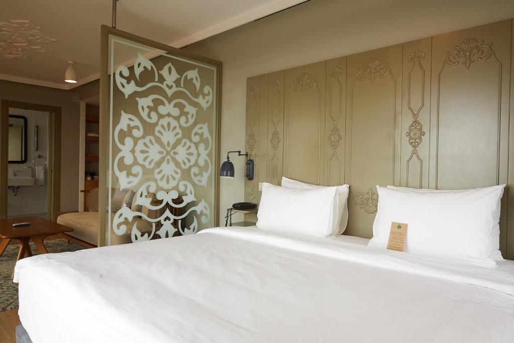 A bed or beds in a room at The Cettia Istanbul