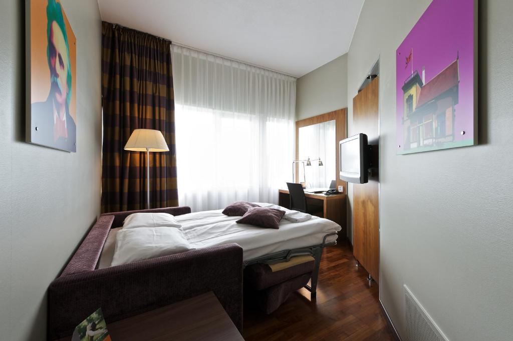 Postel nebo postele na pokoji v ubytování Quality Hotel Edvard Grieg