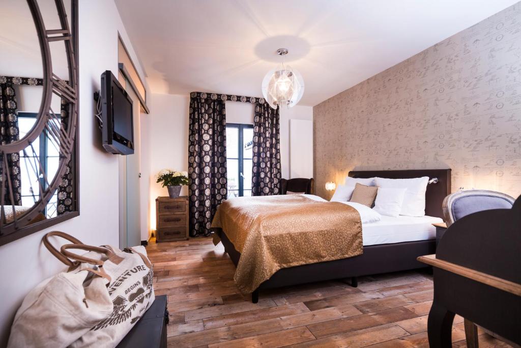 Postel nebo postele na pokoji v ubytování Hotel & Restaurant Grenzhof