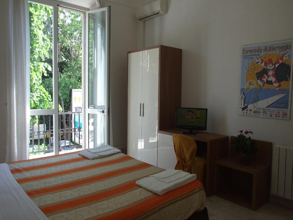 Postel nebo postele na pokoji v ubytování Hotel Derna