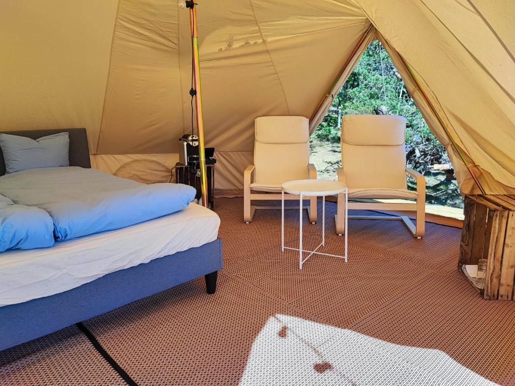 Postel nebo postele na pokoji v ubytování Unda Camping & Resort