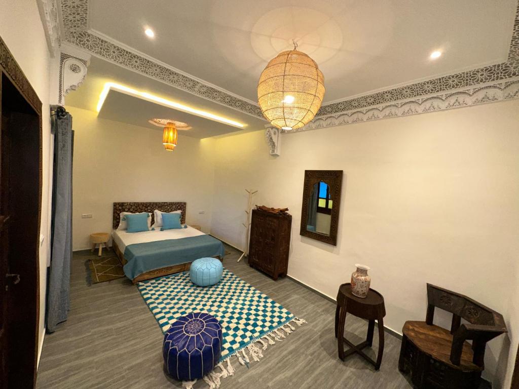 Postel nebo postele na pokoji v ubytování Oasis Merasi Marrakech