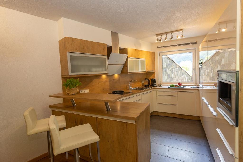 Kuchyňa alebo kuchynka v ubytovaní Appartements Fürstauer, JOKERCARD INCLUDED