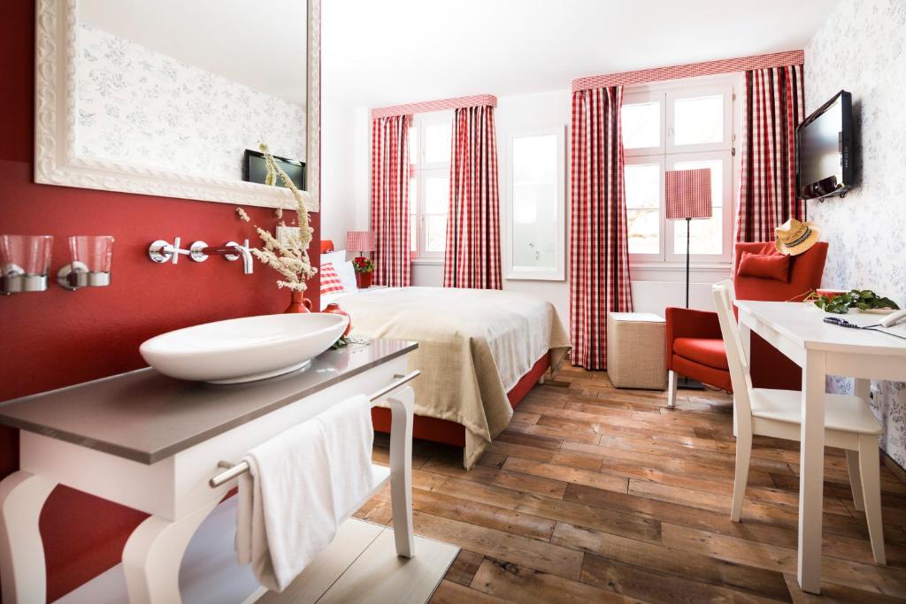 TV a/nebo společenská místnost v ubytování Hotel & Restaurant Grenzhof