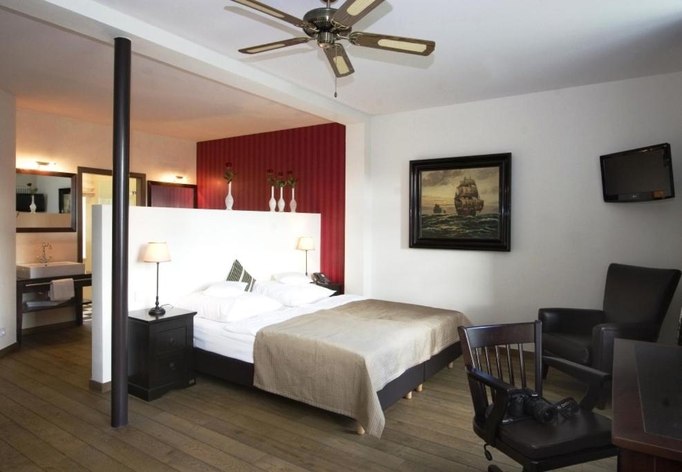 Postel nebo postele na pokoji v ubytování Hotel & Restaurant Grenzhof