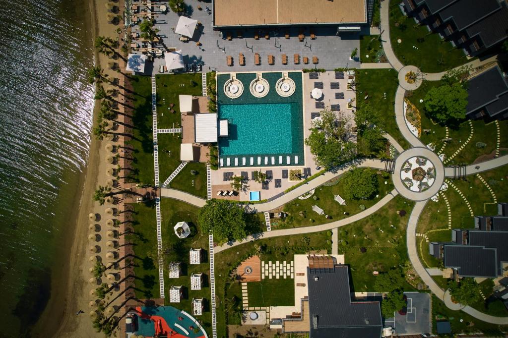 an aerial view of a resort with a swimming pool at Parmos Otel in Erdek