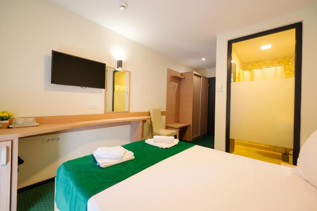 Postel nebo postele na pokoji v ubytování Hotel Parc