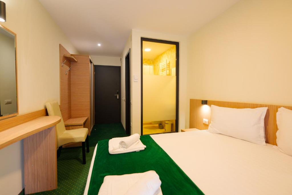 Postel nebo postele na pokoji v ubytování Hotel Parc