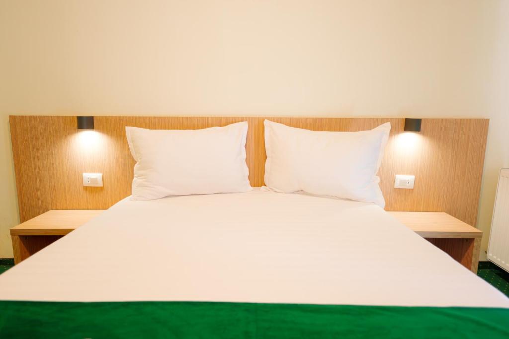 Postel nebo postele na pokoji v ubytování Hotel Parc