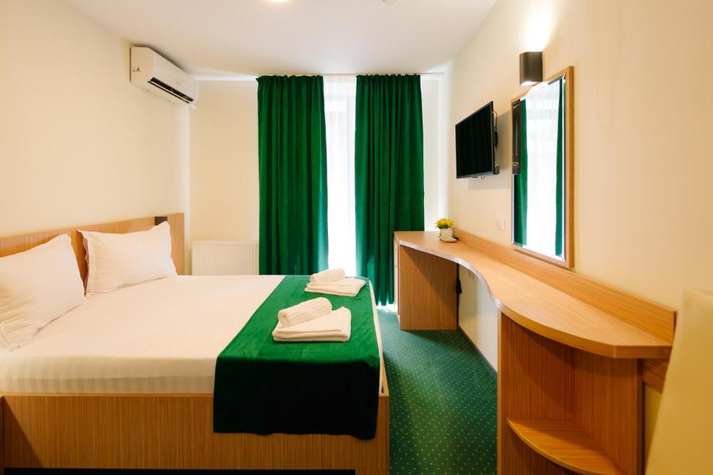 Postel nebo postele na pokoji v ubytování Hotel Parc