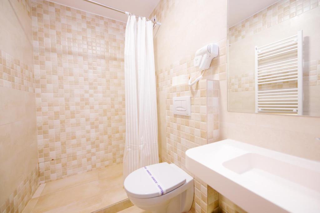 Koupelna v ubytování Hotel Parc
