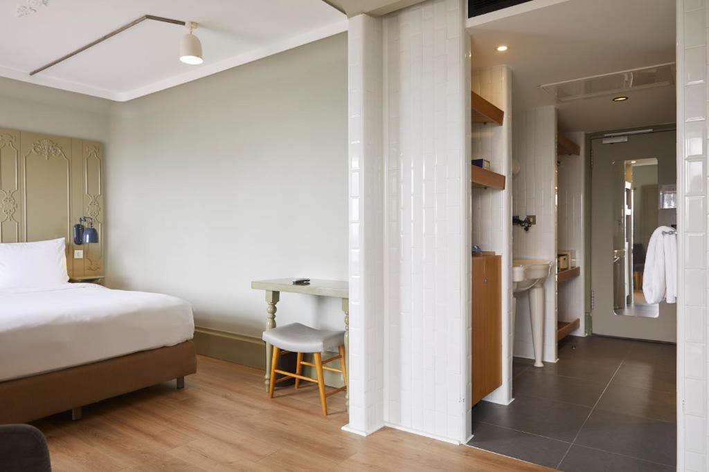 A bed or beds in a room at The Cettia Istanbul