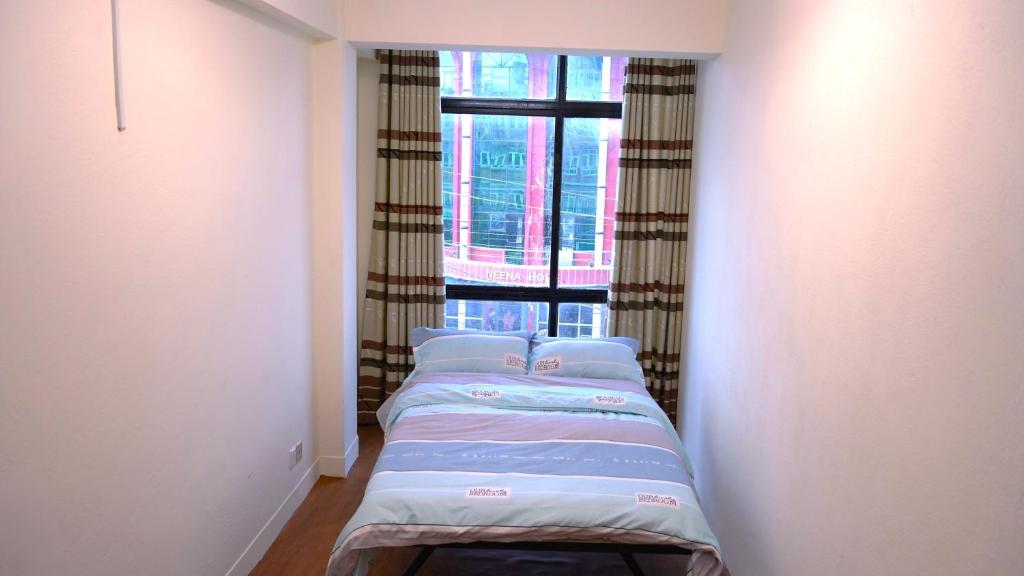Postel nebo postele na pokoji v ubytování Hotel Ryan