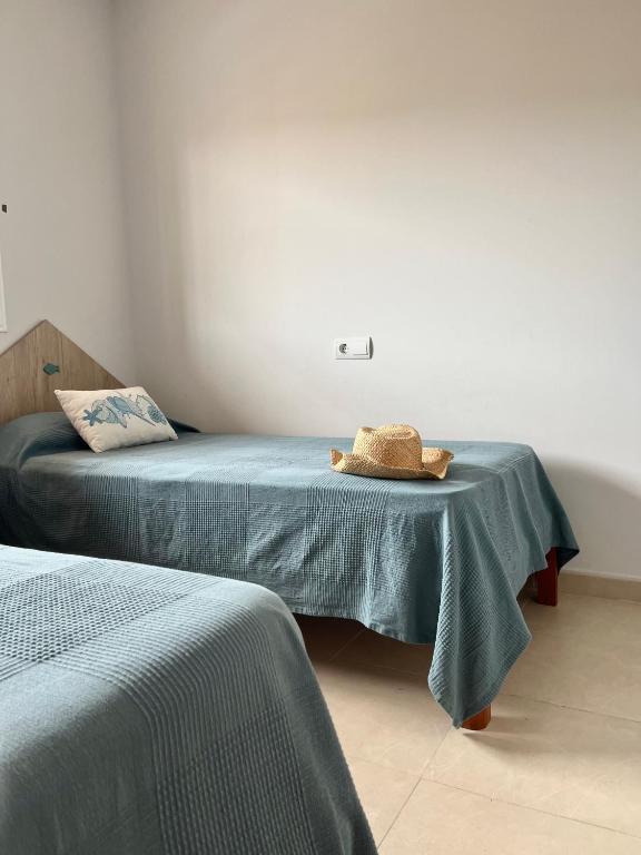 Postel nebo postele na pokoji v ubytování ÁTICO Paraíso Beach con piscina privada