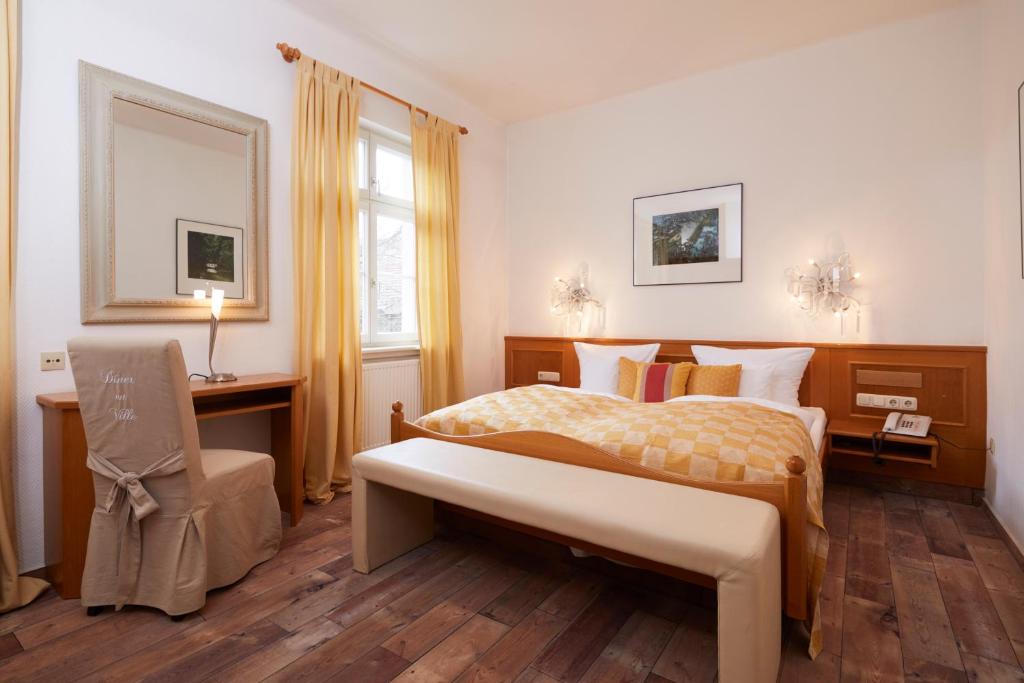 Postel nebo postele na pokoji v ubytování Hotel & Restaurant Grenzhof