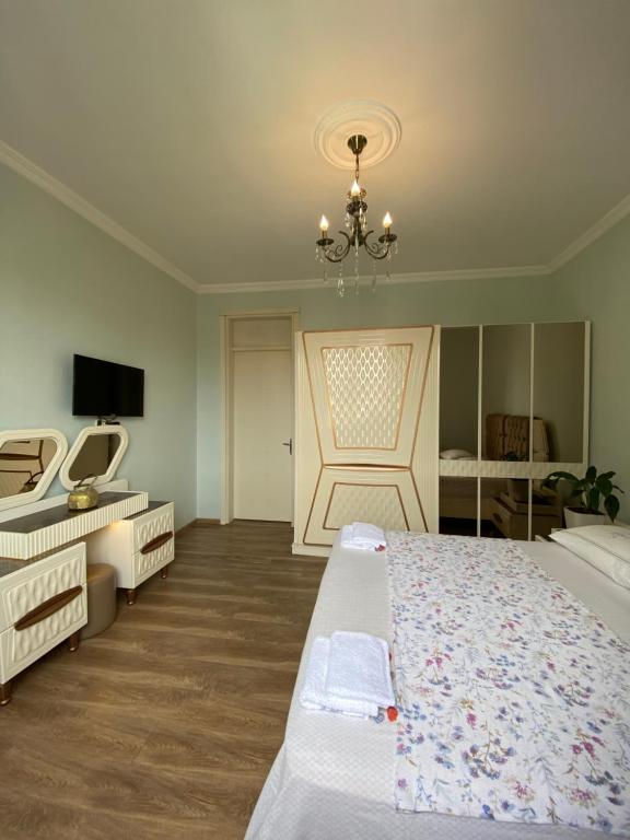 TV a/nebo společenská místnost v ubytování Sunny Days