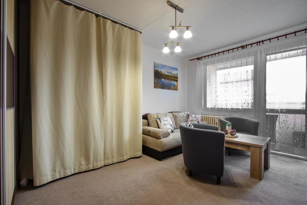 Posezení v ubytování Apartmán u Klínovce
