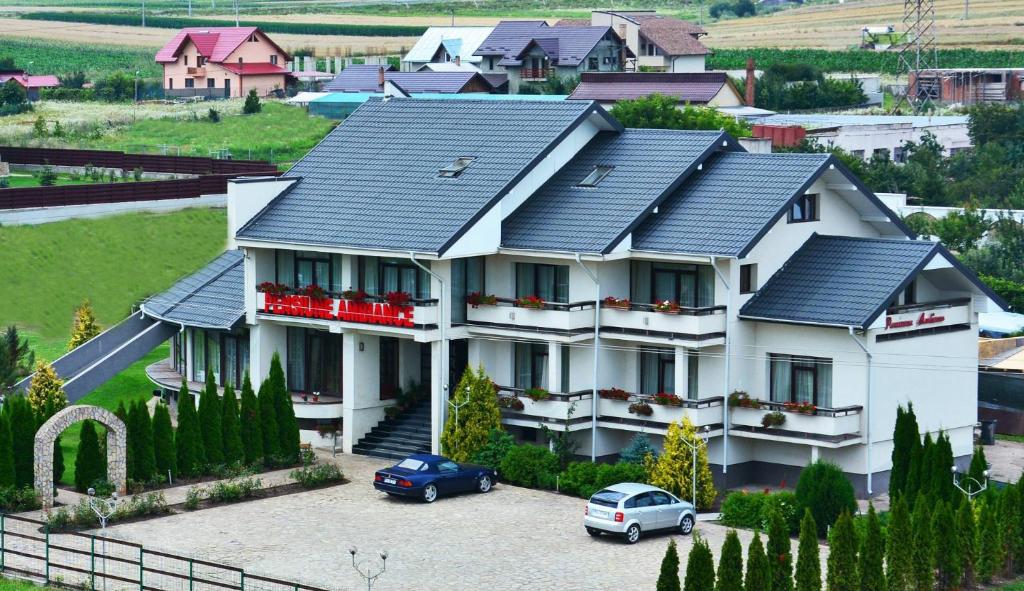 a model of a house with solar panels on it at Madrigal Boutique Rooms in Scheia