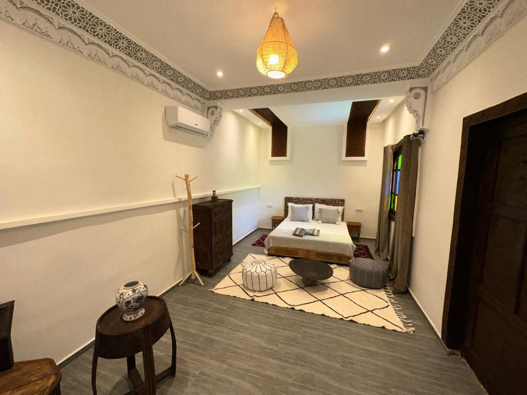Postel nebo postele na pokoji v ubytování Oasis Merasi Marrakech