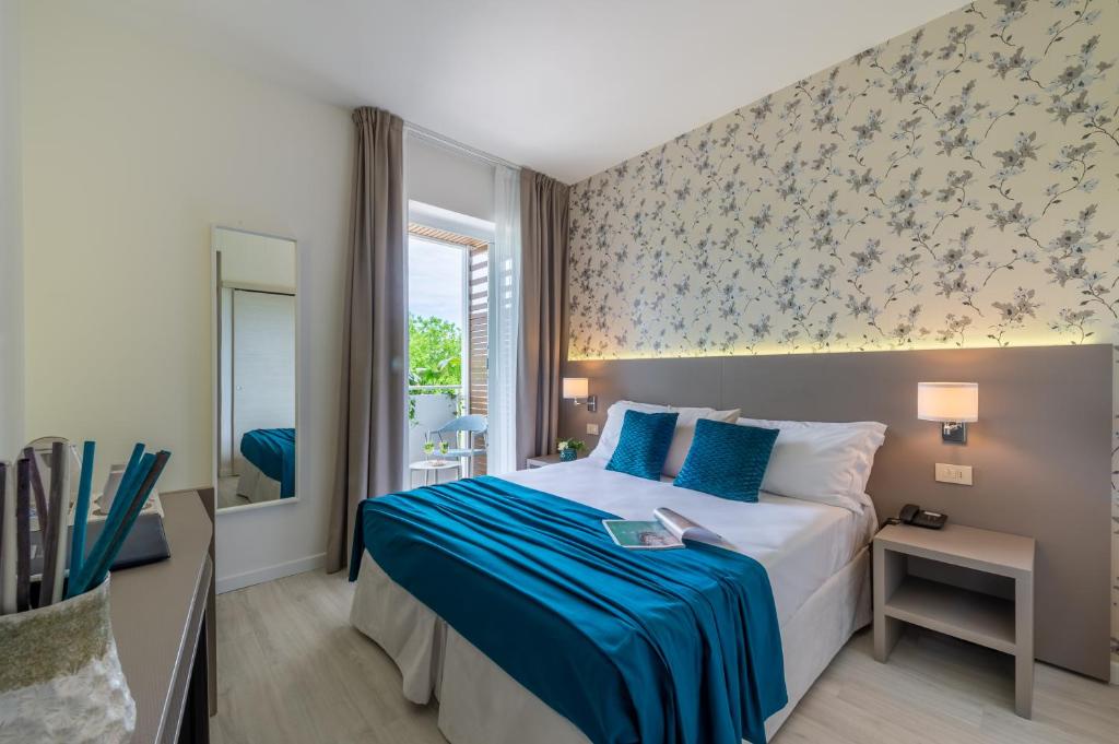 Postel nebo postele na pokoji v ubytování Hotel Renania